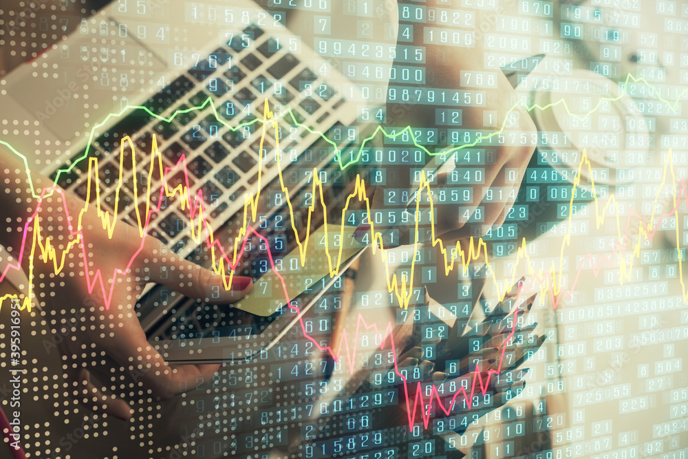 Double exposure of businesswoman hands typing on computer and financial graph hologram drawing. Stock market analysis concept.