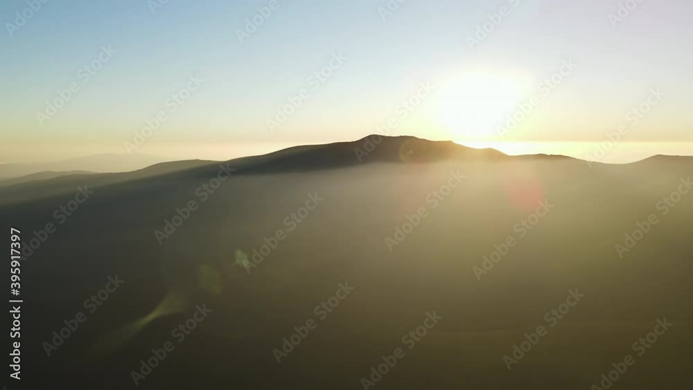 Mountain Range Silhouette Sunset Aerial View. Scenic Dawn Sunlight Mountain Overview. Wild Nature Landscape. Dramatic Sky, Clouds. Drone Flight Footage 4K Mountain Range Silhouette Sunset Aerial View. Scenic Dawn Sunlight Mountain Overview. Wild Nature Landscape. Dramatic Sky, Clouds. Drone Flight Footage 4K