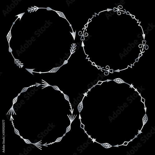 set of four round isolated tribal patterned frames made of arrows, made with a silver outline, merged into one contour, vector illustration.Design and decoration of greeting cards, clipart, scrapbooki photo