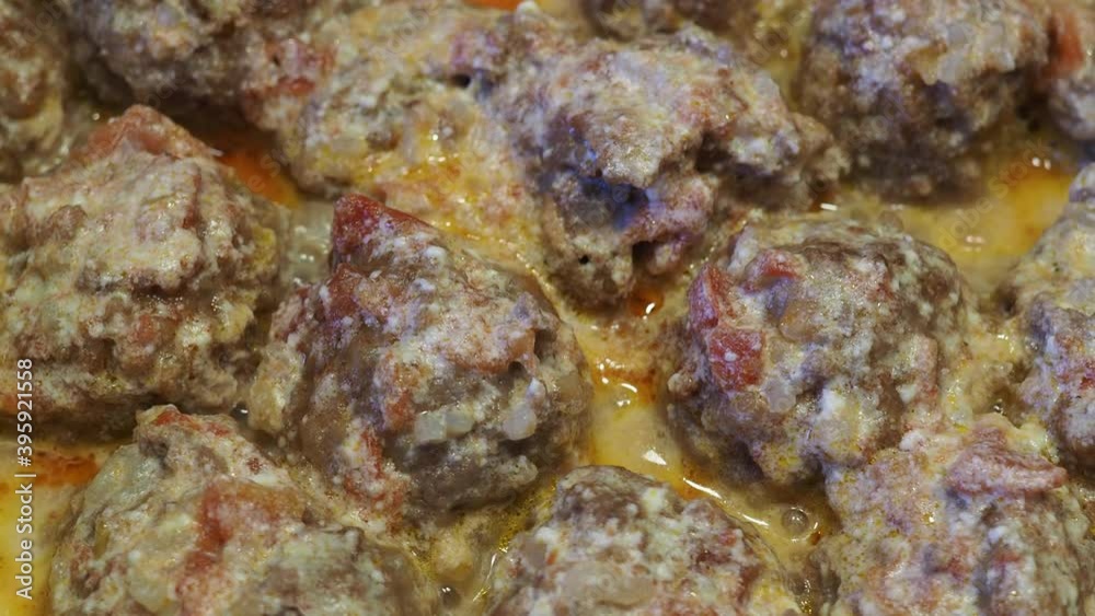 meatballs with rice are cooked in tomato and cream sauce meatballs with rice are cooked in tomato and cream sauce