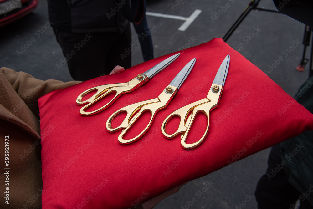 Golden scissors for the ceremonial ribbon-cutting at the opening ceremony.