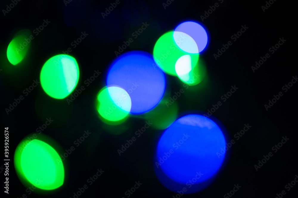 Abstract bokeh background wallpaper. colorful lights on a black background Abstract bokeh background wallpaper. colorful lights on a black background