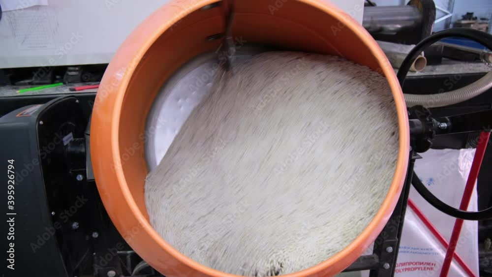 Machine with tank rotates mixing plastic material in shop Machine with tank rotates mixing plastic material in shop