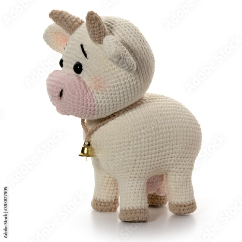 White cow on a white background. Knitted toy. Full depth of field. With clipping path. © gna60