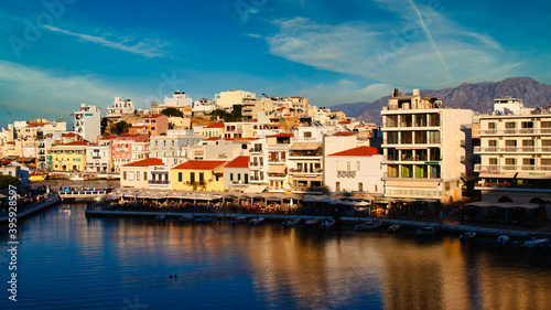 Obraz na płótnie View of the bay of Agios Nikolaos (Crete island) with the famous port and buildings w salonie