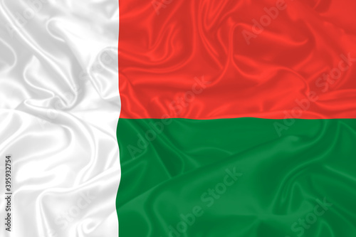 Madagascar Flag waving. National flag of Madagascar with waves and wind. Official colors and proportion. Malagasy Flag photo