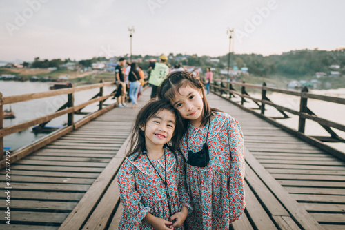 Two children travel at Mon Bridge bridge