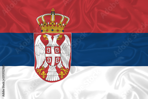 Serbia Flag waving. National flag of Serbia with waves and wind. Official colors and proportion. Serbian Flag photo