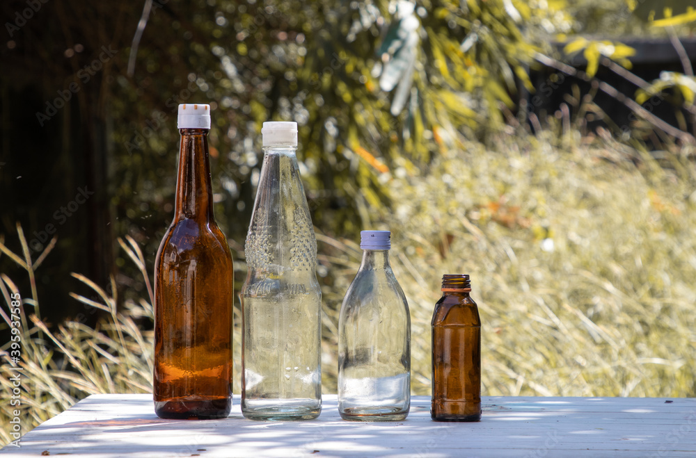 Glass bottle with natural background