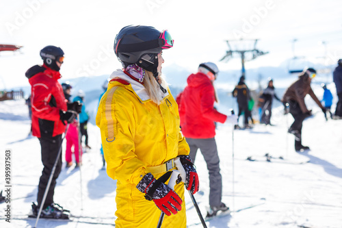 Woman skier enjoy in winter sunny day, holiday