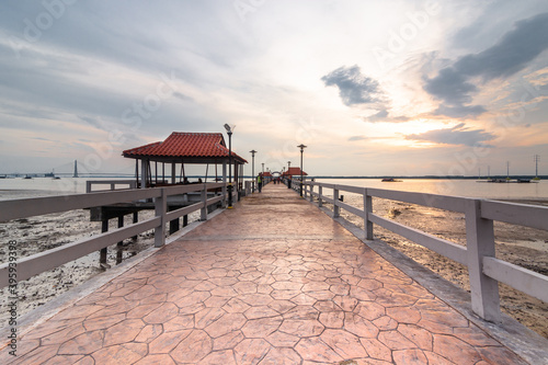 Beautiful jetty during sunset at Telok Sengat, Johor Malaysia. photo