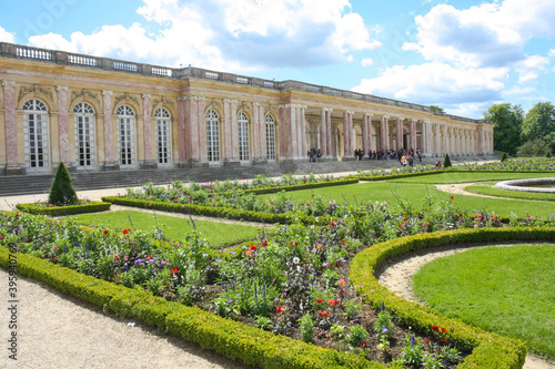 the grand trianon palace in versailles park