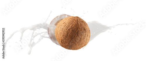 coconuts with milk splash isolated on a white background