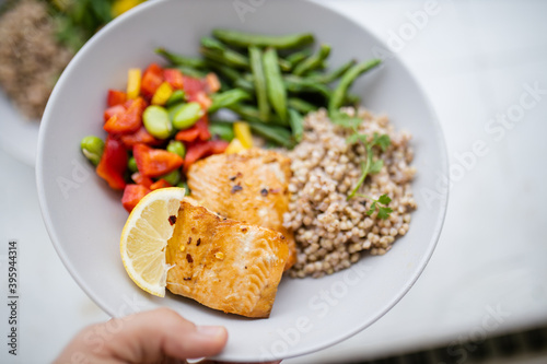 Salmon and buckwheat dish with green beans and tomato © Christian