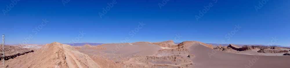 Panorama of dark sand dune, Valley of the moon in Atacama salt desert, Chile