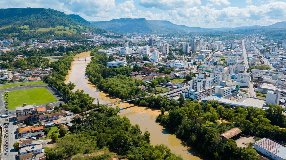 Rio do Sul - SC. Aerial view of the city and Itajaí river with its bridges