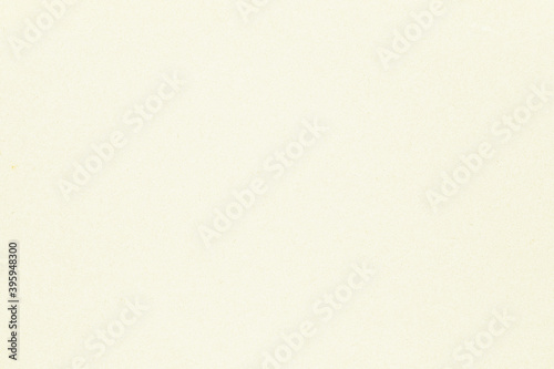 Pale yellow fine smooth background paper texture 