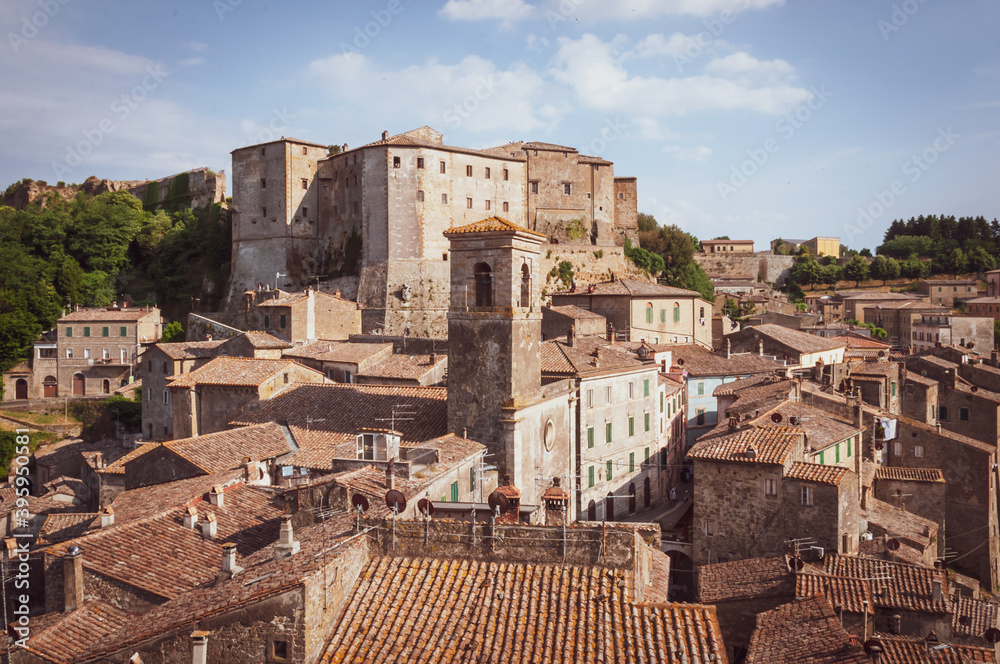 Panoramic view over the old town of Sorano. Rocca Orsini fortress stands on a hill overlooking the town. Tuscany, Italy