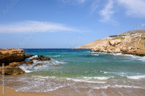 Koumbara beach located in a rocky bay on Ios Island.Cyclades, Greece © vivoo