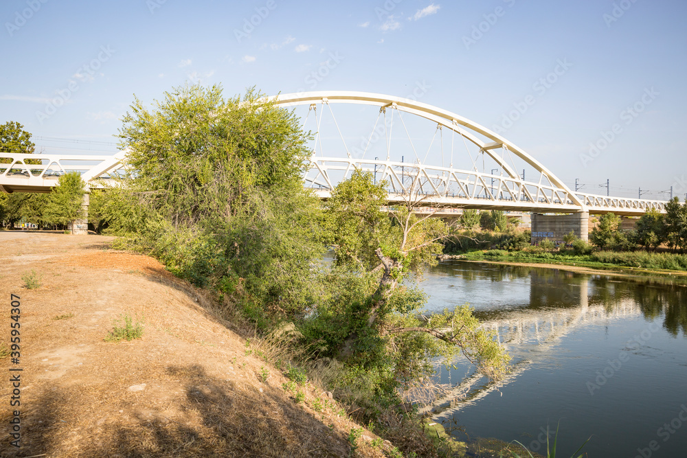 Fototapeta premium railway bridge over Ebro river in Zaragoza city, Aragon, Spain