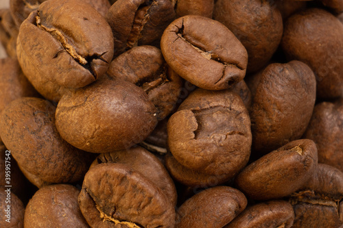 Macro photo of whole roasted coffee beans