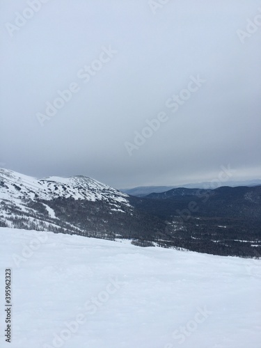 Holidays in the mountains, cold winter, landscape of snowy peaks © Maxim