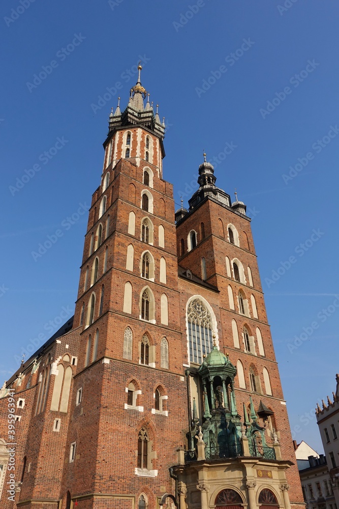 KRAKOW, POLAND -View of the Saint Mary's Basilica, a brick Gothic church on the Main Market Square in Kraków, Poland.