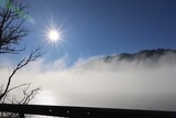 sun and fog in mountains