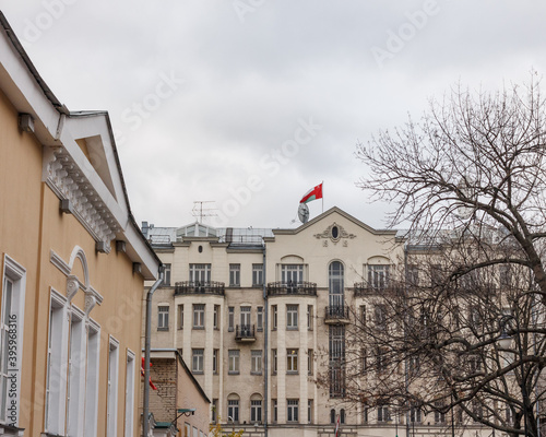 Fototapeta Naklejka Na Ścianę i Meble -  Moscow, Russia. Embassy of the Sultanate of Oman.  Oman flag fluttering in the wind