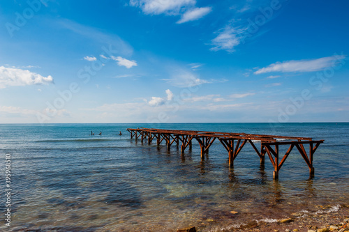 Old pier in the sea