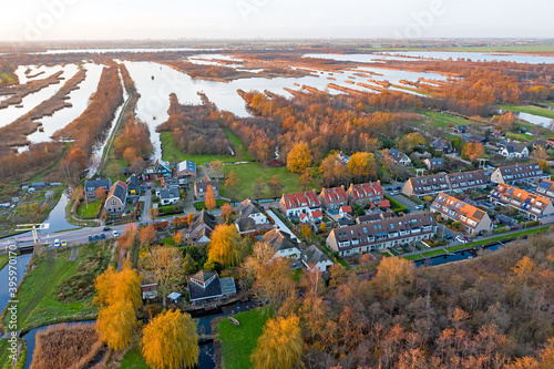 Aerial from Ankeveen and the Ankeveense plassen in the Netherlands at sunset photo