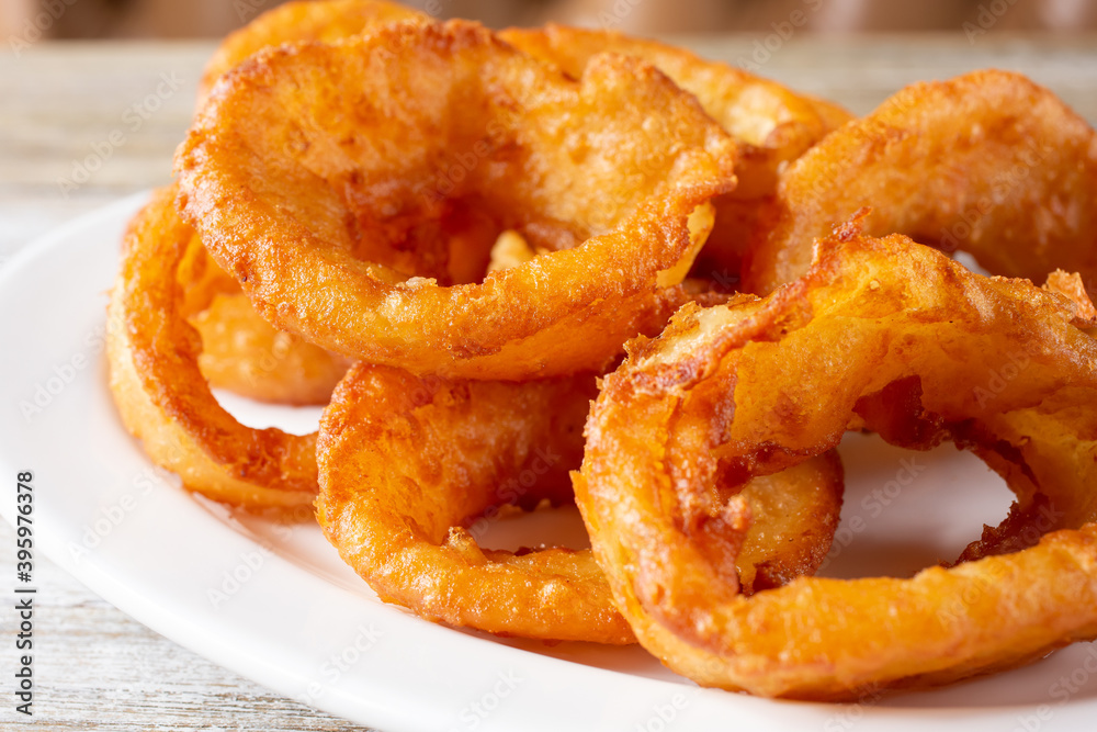 A view of a plate of onion rings. A view of a plate of onion rings.