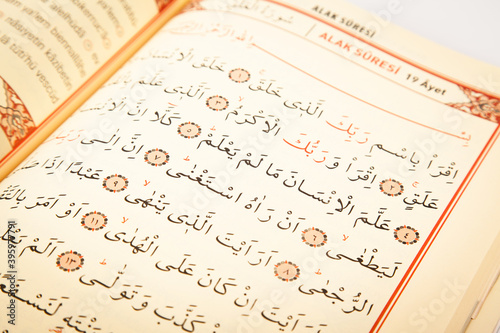 Pages verses from the holy book of islam religion quran, kuran and chapters, surah alak from the Quran
