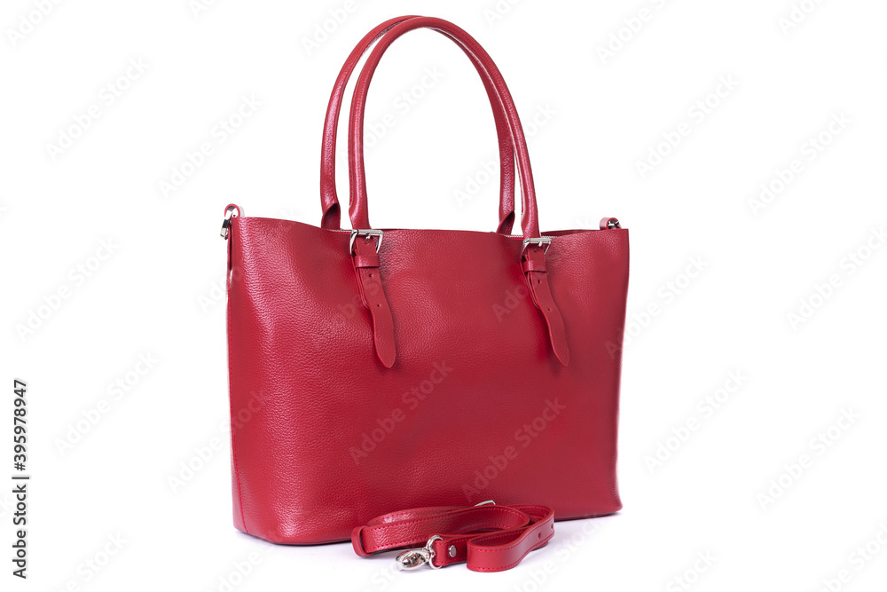 Naklejka premium red stylish ladies leather bag on a white background