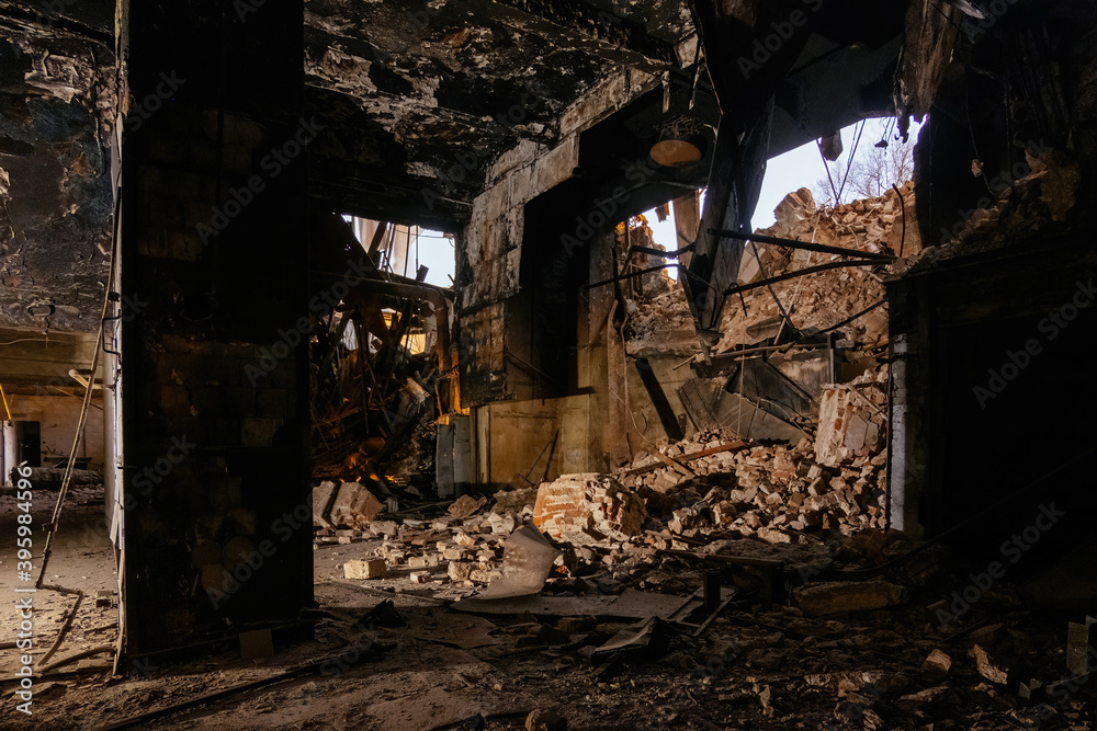 Fototapeta premium Burnt interior of industrial building or warehouse. Consequences of fire