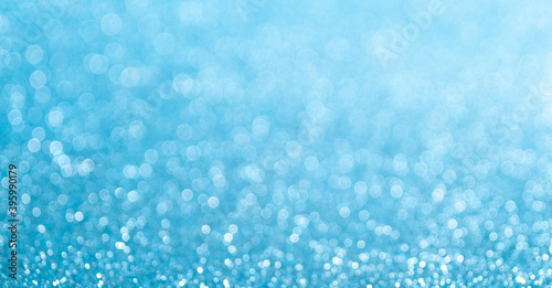 White light blue glitter bokeh texture abstract background