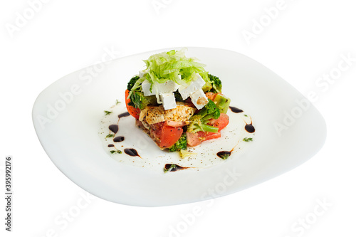 Salad with chicken, feta, tomato, broccoli isolated on white