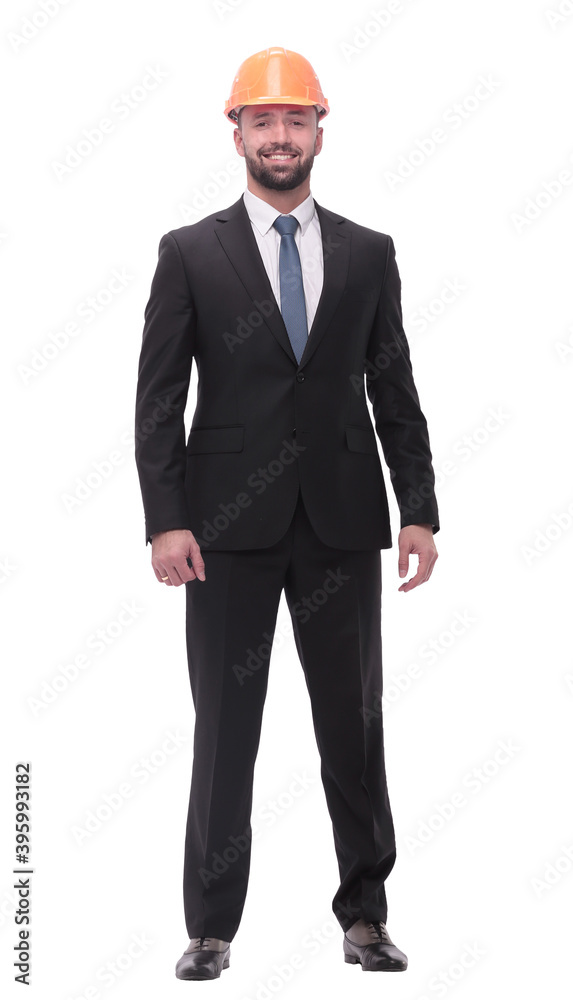 in full growth. successful businessman in a protective helmet in full growth. successful businessman in a protective helmet