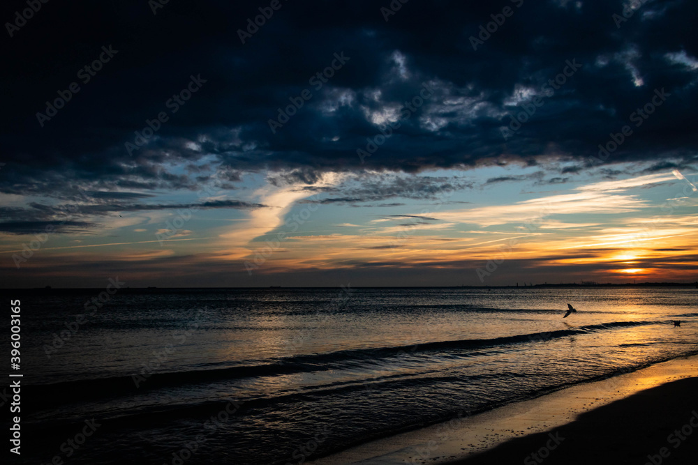 beautiful, mystical sunrise over the calm sea beautiful, mystical sunrise over the calm sea