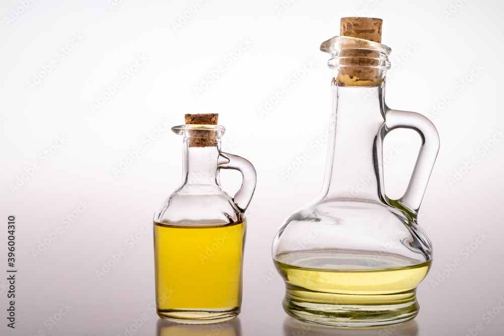 Oil in glass containers. Household oil jugs. Oil in glass containers. Household oil jugs.