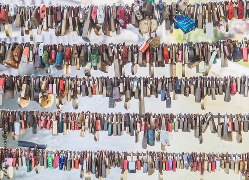 Ljubljana, Slovenia, September 2020: the locks that the lovers have attached to the bridge