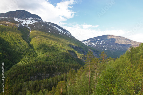 a view of mountains during summer time with little snow near the summit  © Kersti Lindström