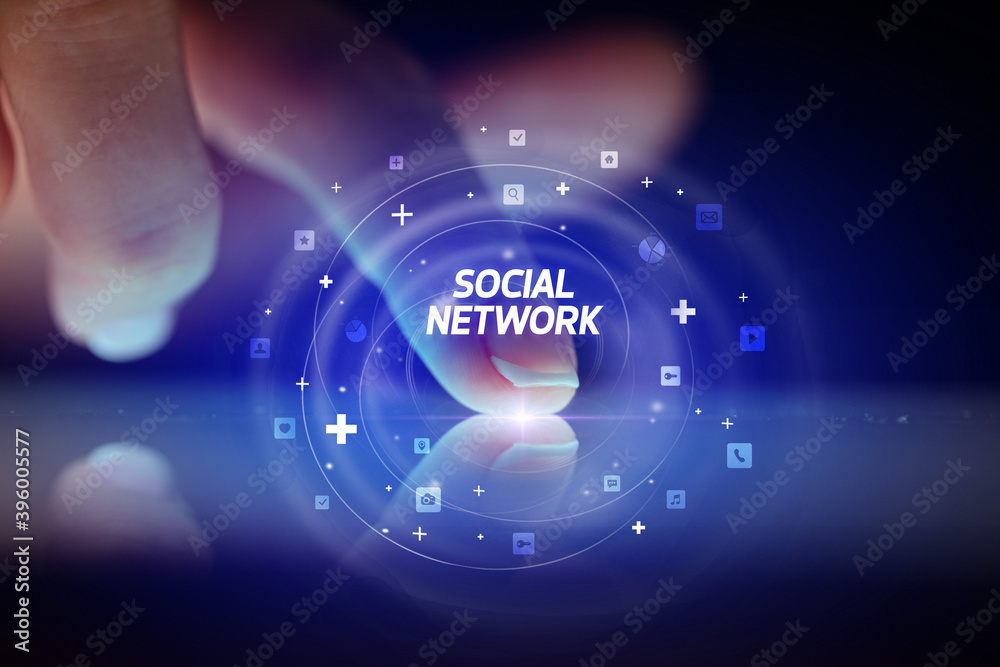 Finger touching tablet with social media icons and SOCIAL NETWORK Finger touching tablet with social media icons and SOCIAL NETWORK