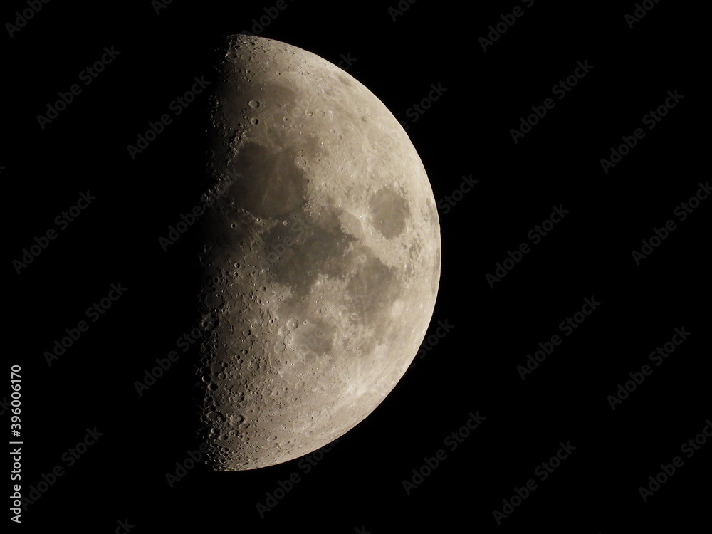 Young growing moon close up against the black sky Young growing moon close up against the black sky