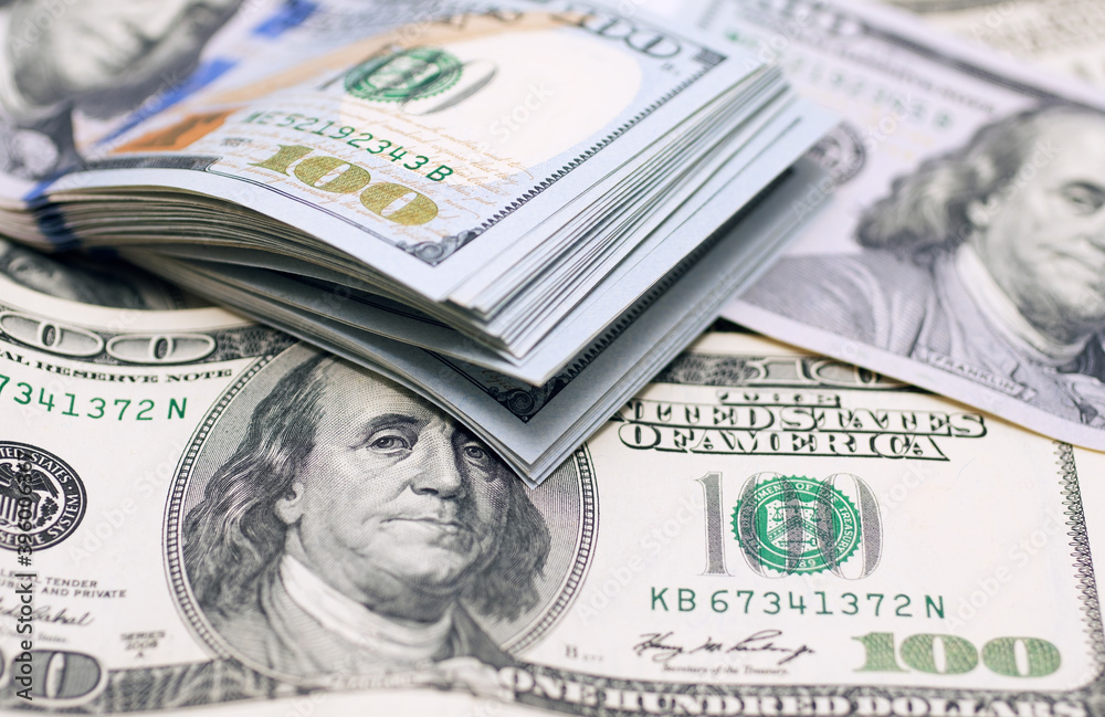 Stack of money american hundred dollar bills on white background Stack of money american hundred dollar bills on white background