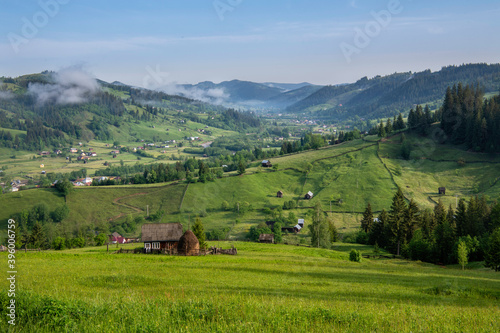 Morning Landscape in Bucovina, Romania. Misty hills and mountains
