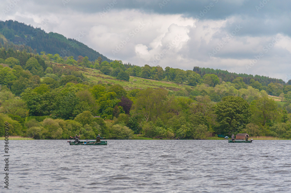 Boats with fishermen in Lake of Menteith, Scotland. Concept: Scottish landscapes, Scottisch lakes