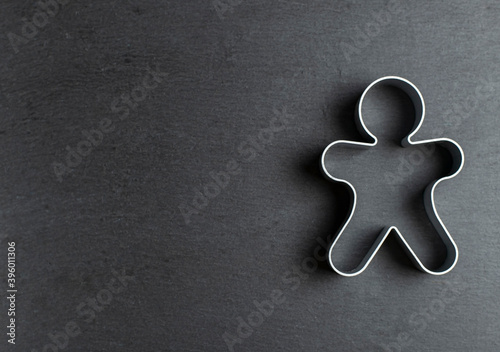 cookie mold in the form of a man on ardesia