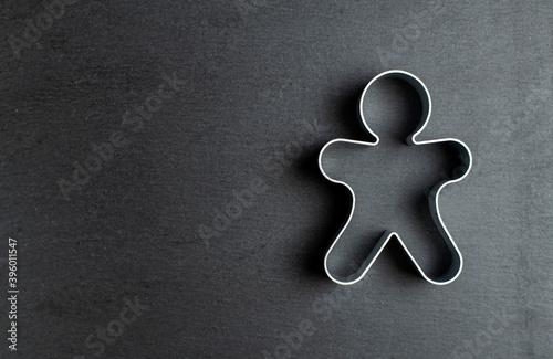 cookie mold in the form of a man on ardesia