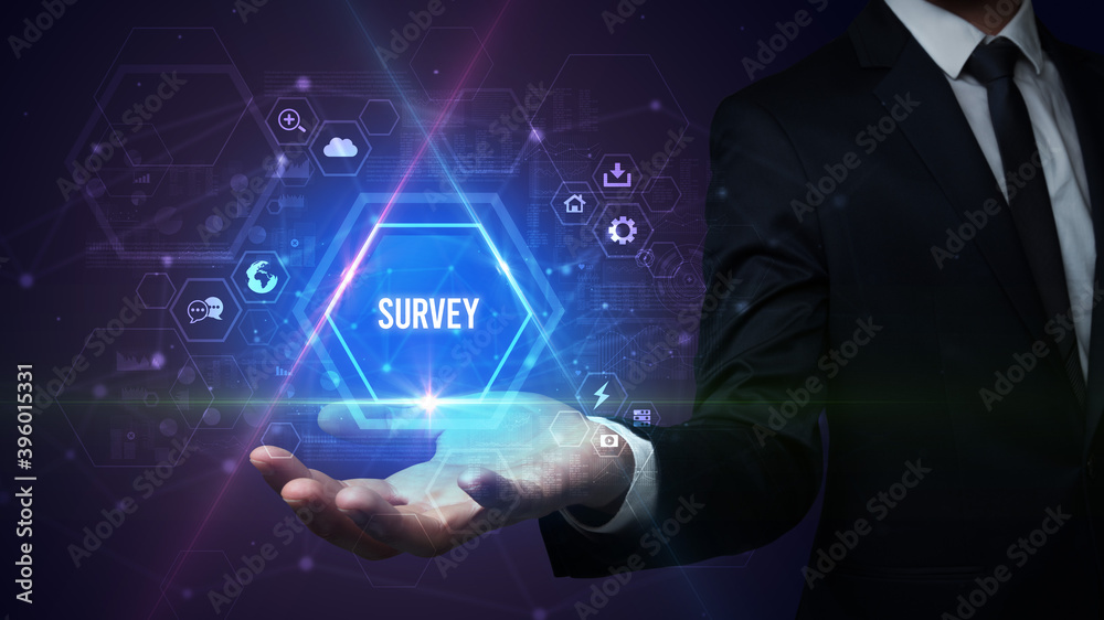 Man hand holding SURVEY inscription, social media concept Man hand holding SURVEY inscription, social media concept